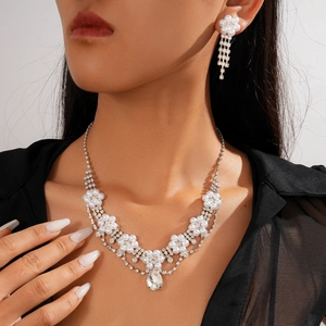 Elegant jewelry set with flower pearl necklace and teardrop rhinestone earrings