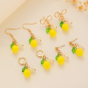 Handmade lemon flower leaf drop earrings with gold hooks and white pearl floral accents