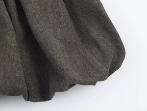 Macro detail of the dark gray linen fabric texture on this fashion mini balloon dress