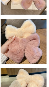 Detail of plush bow hair clips in pink and beige, soft winter accessories close-up