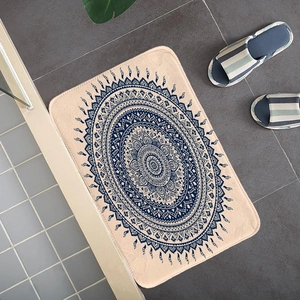 Detail of a square flannel mandala mat with dark blue patterns on beige background