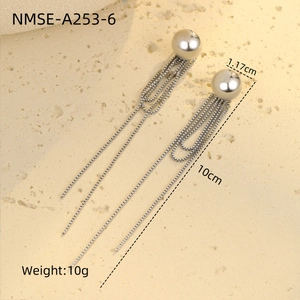 Detail of silver tassel earrings showing 10cm length and 1.17cm sphere diameter