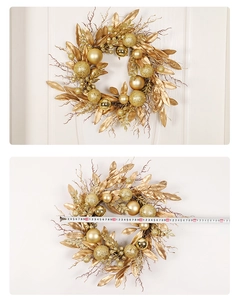 Detailed close-up of a 50cm golden Christmas wreath with ornaments and measuring tape