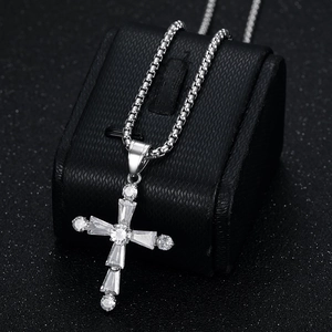 Silver stainless steel cross pendant necklace with AAA zircon stones on black jewelry box