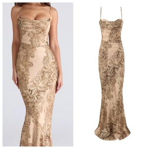 Detail of champagne floral satin maxi dress showing slim fit and mermaid hemline