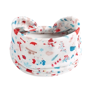 Detailed view of a white Christmas knotted headband featuring festive snowman and gift patterns
