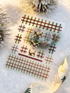 Detail view of YT6461 Christmas nail stickers with red and green plaid bow patterns