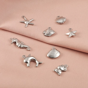 Polished silver stainless steel ocean charms set featuring starfish and seahorse for DIY