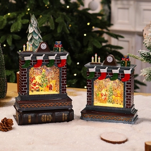 Close-up of a festive Christmas fireplace music box with glowing snow globe and hand-painted details