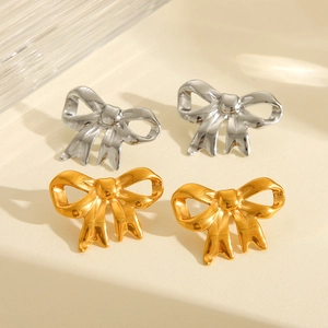 Polished gold and silver stainless steel bow knot stud earrings in a stylish 3D ribbon design