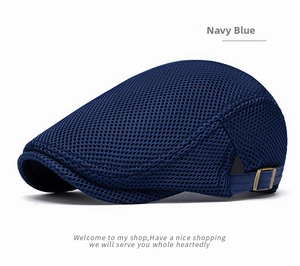 Detail of navy blue mesh flat cap featuring breathable fabric and metal buckle adjustment