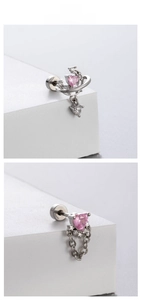 Detail of pink heart zircon earrings with moon stars and chain in silver titanium steel