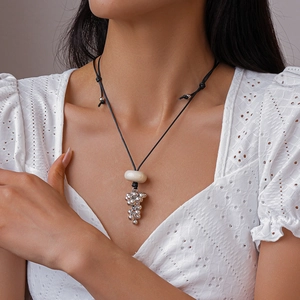 Retro wax cord necklace with white resin bead and silver grape cluster pendant