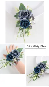 Close-up of misty blue silk rose corsage and wrist flower with pearls and greenery