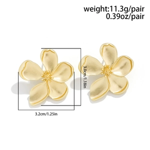 Detail view of gold ginkgo leaf flower earrings with dimensions 3.2cm by 3.0cm