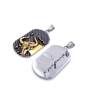 Vintage stainless steel Taurus zodiac pendant with embossed bull head and golden finish