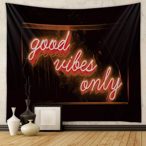 Bohemian black tapestry with neon red 'Good Vibes Only' text for wall decor