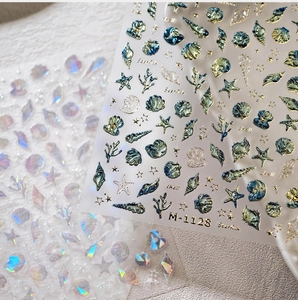 Detail of M-1128 3D ocean nail stickers with metallic starfish and shell relief texture