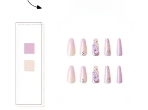 Close-up of purple gradient press-on nails with 3D floral accents and rhinestones