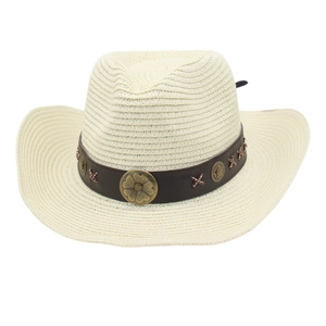 Macro view of woven straw cowboy hat with vintage brown leather band and metal studs