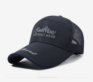Detail of navy mesh baseball cap featuring silver badforce embroidery and sport print