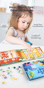 Close-up of a toddler using an educational busy book with Velcro stickers for early learning