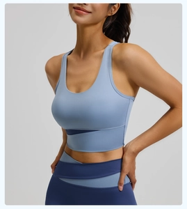 Détail du legging de yoga taille haute avec taille en V contrastée bicolore bleue