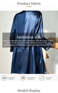 Detailed view of silk-like satin robe showing fabric texture and care instruction icons