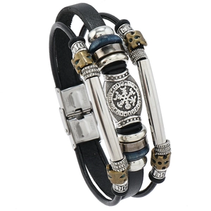 Vintage Viking leather bracelet with multi-layer braided straps and metallic skull beads