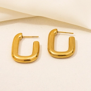 Elegant 18K gold plated 304 stainless steel U-shaped hoop earrings on textured surface
