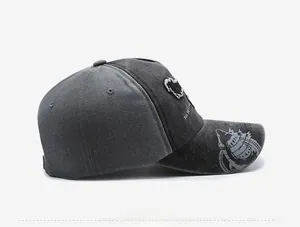 Side view of washed charcoal gray baseball cap with shark skeleton embroidery and distressed detail