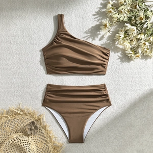 Detail of coffee brown ruched bikini featuring a one-shoulder top and high waist bottom