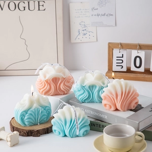 Creative wave-shaped scented candles in gradient colors for modern home decor