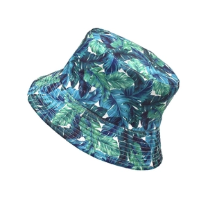 Women's tropical banana leaf bucket hat with palm tree floral print and stitched brim