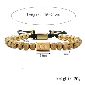 Detailed view of gold star and moon beaded bracelet with size and weight specifications