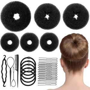 Hair styling tool set including black sponge bun makers, combs, and hair accessories