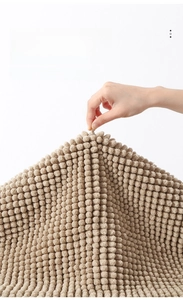 Close-up of high-density brown chenille bath mat showing shedding resistance and soft texture