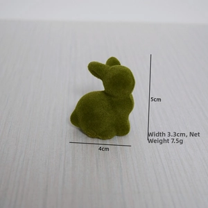 Detailed size view of a 5cm green flocked moss bunny figurine with weight measurements