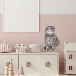 Realistic tabby cat wall sticker displayed in a cozy nursery room with soft pink decor
