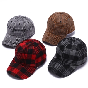 Plaid wool baseball caps in four colors featuring classic autumn winter textures