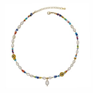 Bohemian style necklace with colorful seed beads, freshwater pearls and evil eye charm