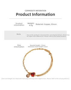 Detailed view of gold plated heart bracelet with red zircon and 17.8cm length specs
