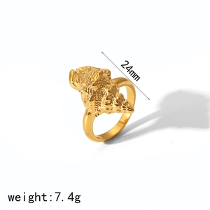 Golden conch shell ring in titanium steel with detailed textured spiral design