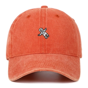 Vintage orange washed cotton baseball cap with white astronaut embroidery and six panels