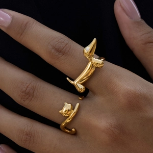 Polished gold stainless steel rings featuring cat and dachshund dog animal shapes