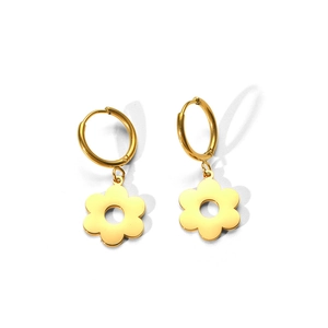 Detailed macro view of 18k gold plated stainless steel floral hoop earrings