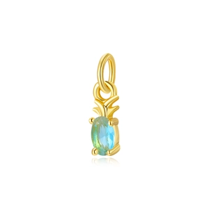 Macro view of a 18k gold plated pineapple charm with a teal gemstone and top loop