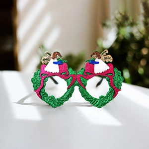 Occhiali natalizi festivi con montatura glitterata verde e fiocchi rossi d'angelo