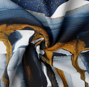 Detailed macro view showing the blue and gold abstract marble texture and fabric weave
