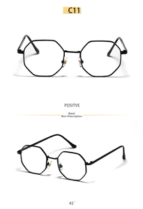 Macro detail of black metal octagonal eyeglass frames showing front and side profile